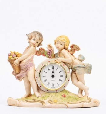 Horloge (1005) coloration porcelaine, dimensions 19x23 cm